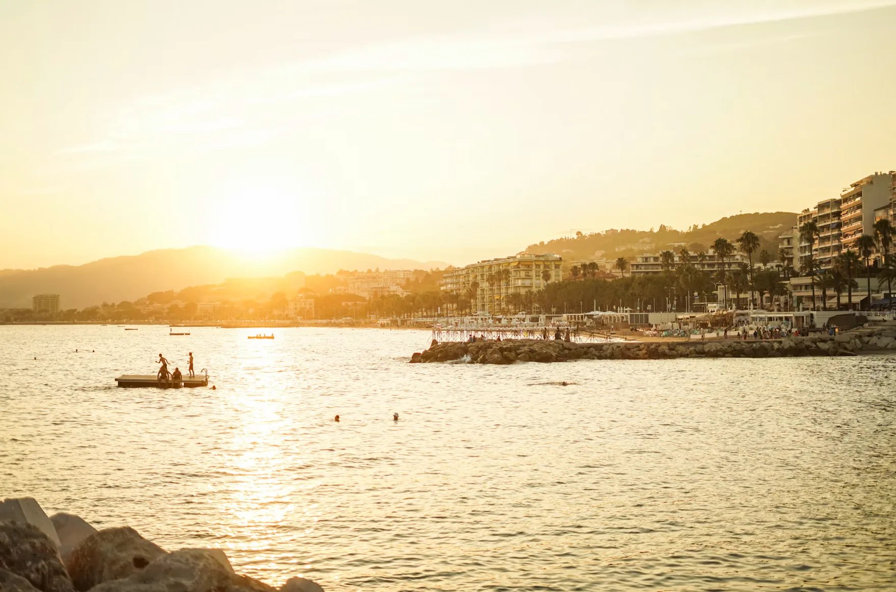 Sunset over the sea and hills of Cannes