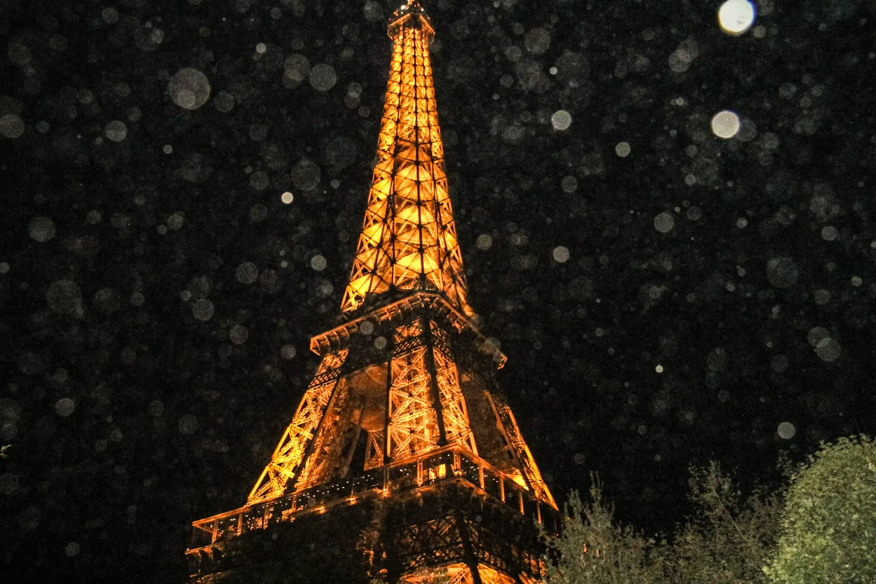 The Eiffel Tower sparkling at night